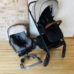 Nuna Mixx Stroller And Car Seat With White Canopy