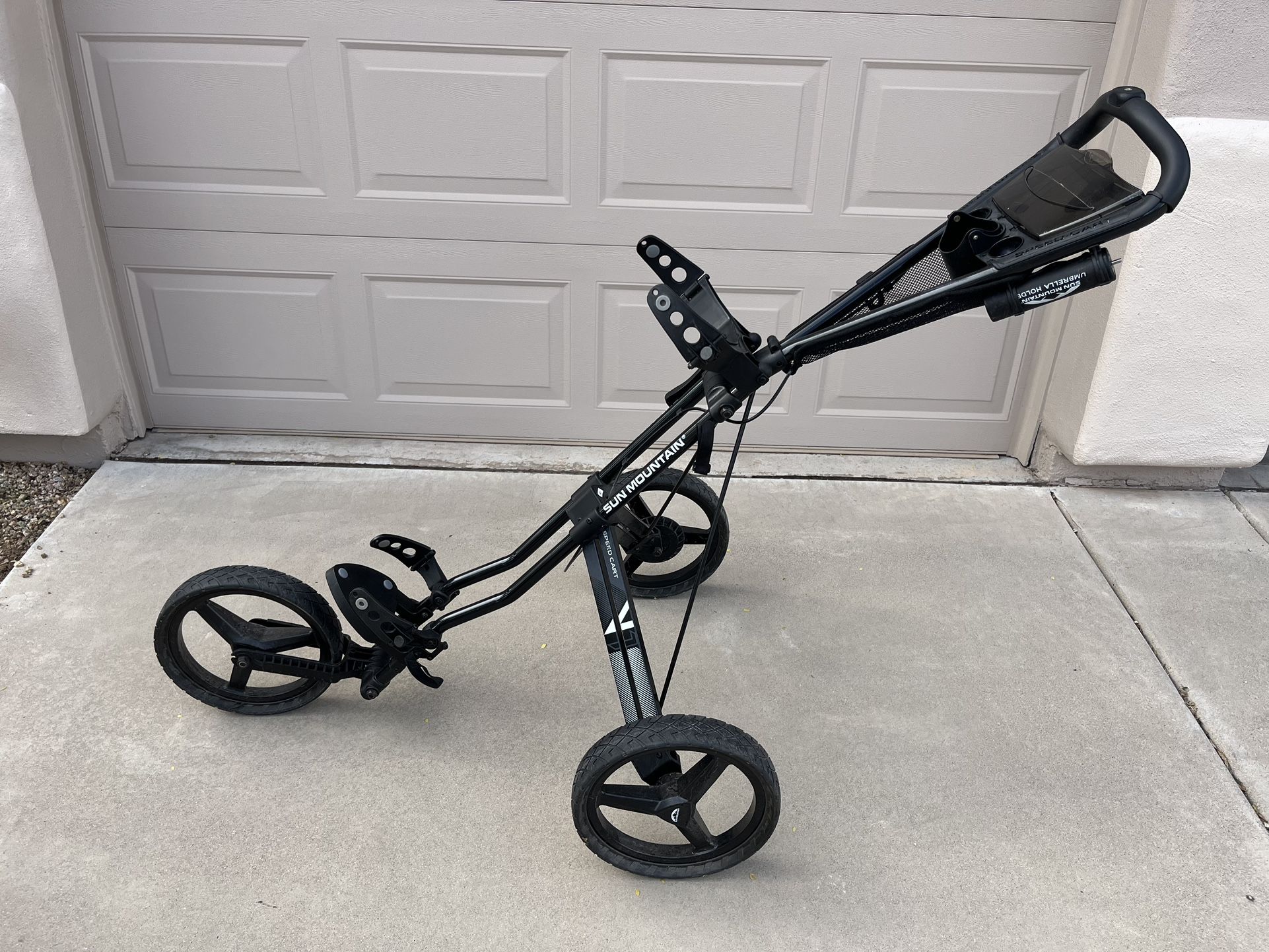 Sun Mountain Speed Cart V1 with umbrella holder golf cart in excellent condition like Clic gear golf cart