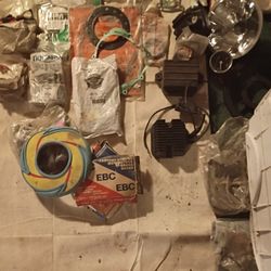 Motorcycle Pistons,Clutches An Assortment of Gasget Sets