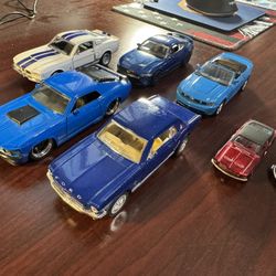A Selection of 5 Ford Mustang Die-Cast Model Cars