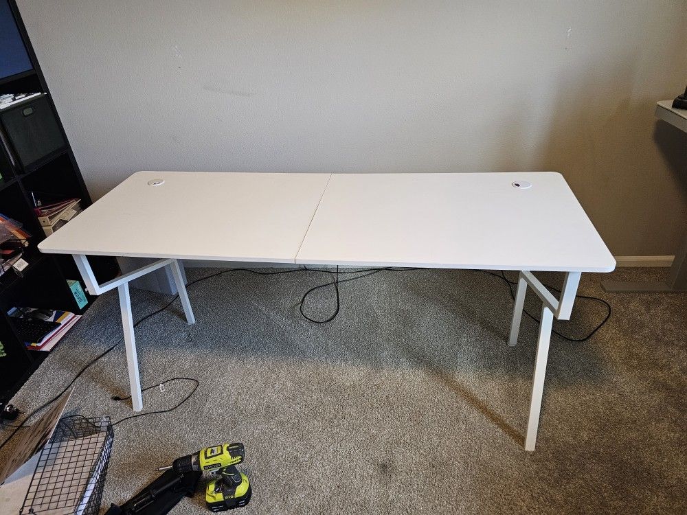 Basic white desk. 24"× 63" hight 29.5"