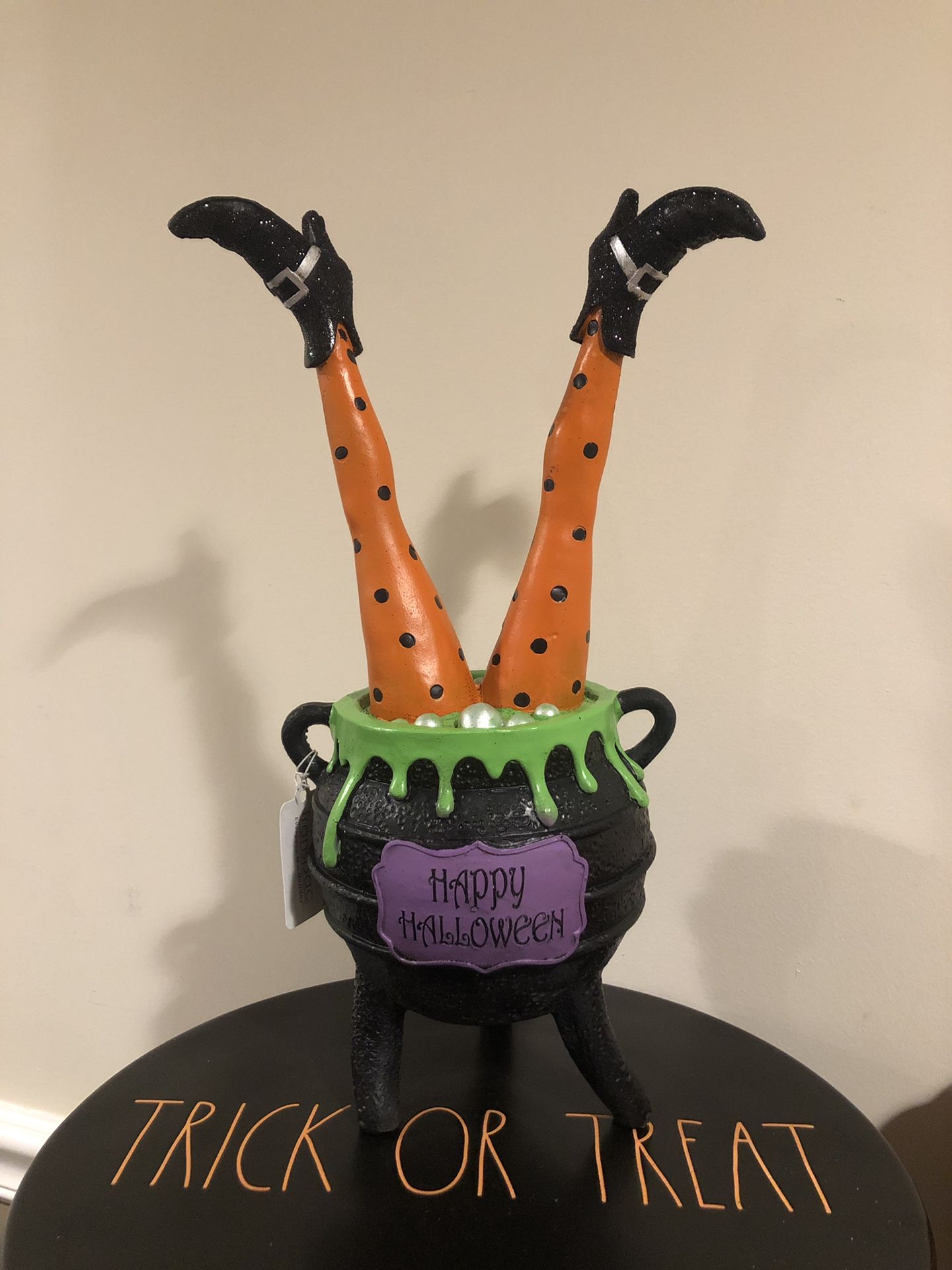 Witch legs and cauldron