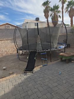 Large Trampoline with Safety Net and Slide