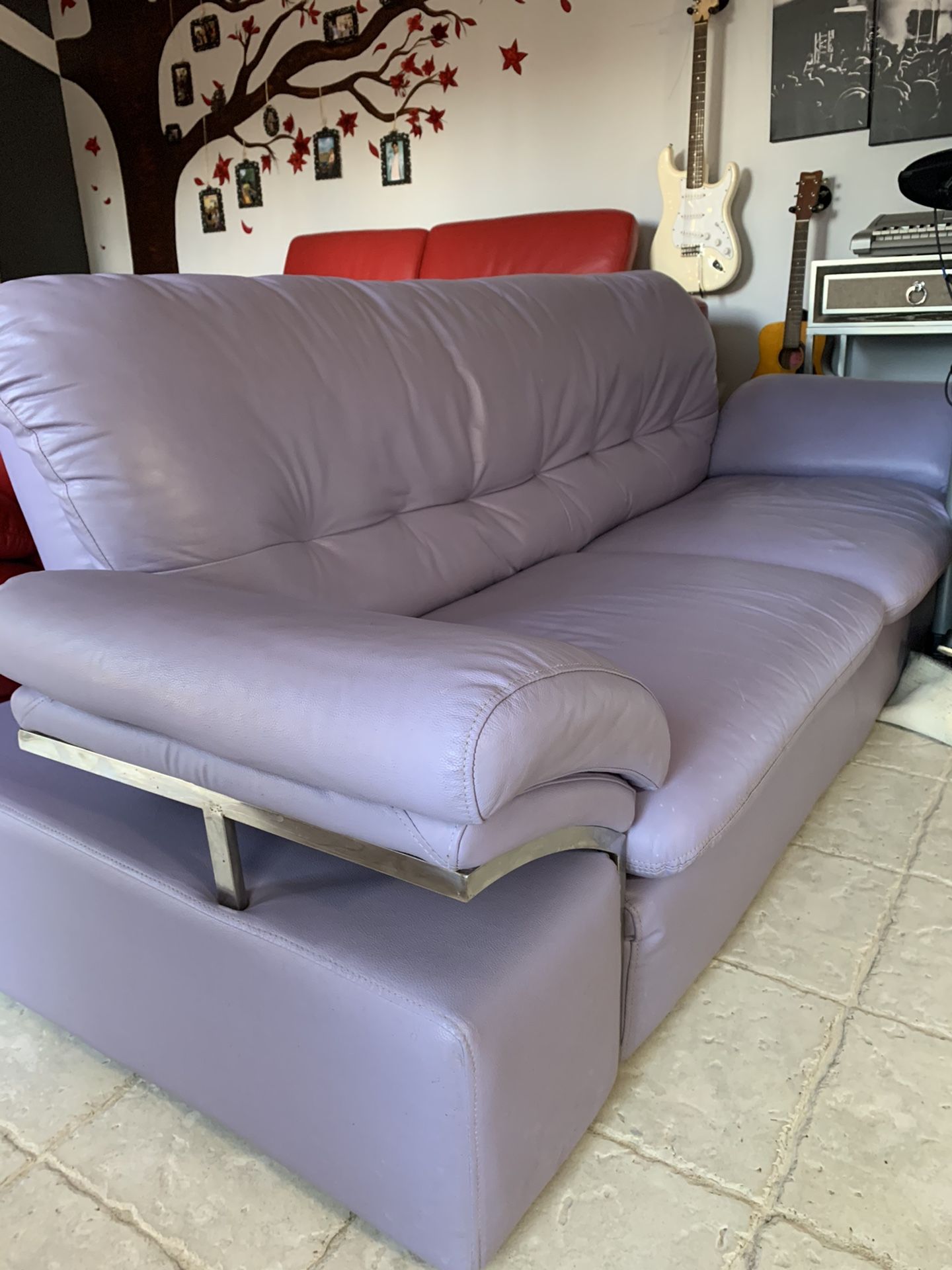 $100 - Lavender/ Lilac Leather sofa