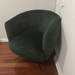 Green velvet swivel chair
