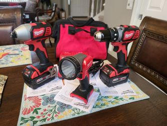 Milwaukee 18V Lithium-Ion Cordless Drill Driver/Impact Driver and flashlight Combo Kit (3-Tool) W/ Two 18v one 3.0ah other 5.0ah batteries/charger ((F