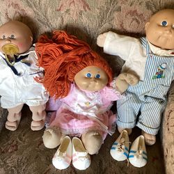 Cabbage Patch Dolls And Clothing