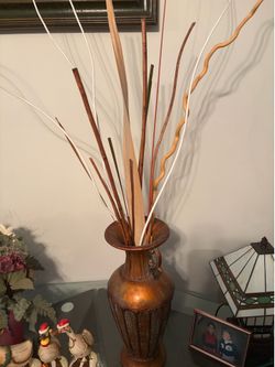 19”  metal vase plus decor.
