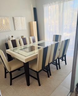 Practically new - dining table sits up to 8