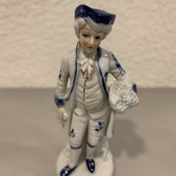Vintage KPM porcelain cobalt blue and white colonial Man figurine 6.50” tall