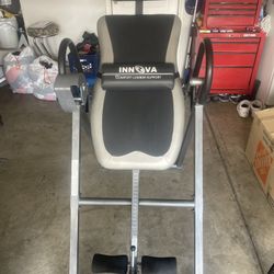 Innova inversion table with a comfort lumbar support cushion.