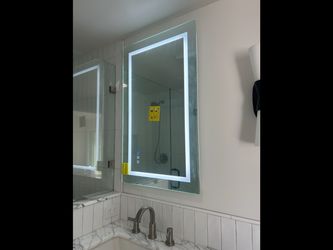 2- Bathroom mirrors, new in the box !
