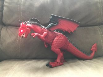 Dragon with Electronic Lights and Sound and Walking Motion.Toy Dragon is in Great condition