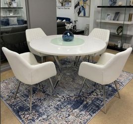 New white dining set. Delivery available.