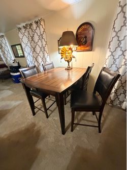 Bar Height Extendable Table and 6 Chairs