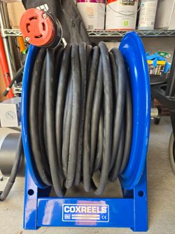 Coxreel Motorized with 200ft portable cord.