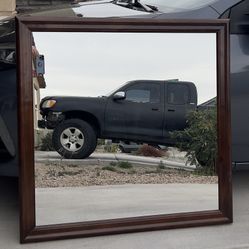 Large mirror with wooden edges