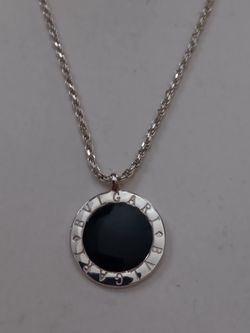 Sterling Jewelry. Very Nice Designer BVLGARI pendant on Sterling 20 inch solid sterling Chain.