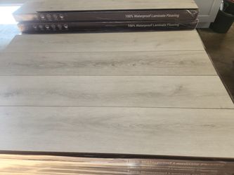 Laminate flooring WPL1001 Laminate pad attached Ligth gray $1.39sqft 15.58sqft/box