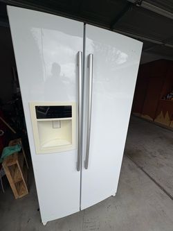 White Side-by-Side Refrigerator with Ice and Water Dispenser