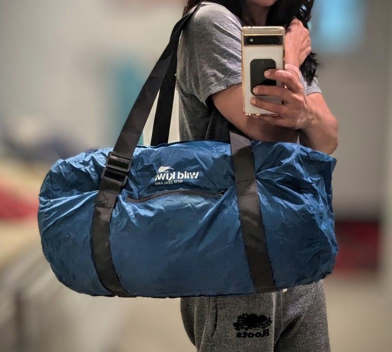 Wild Kiwi New Zealand Packable Ultralight Large Duffle Bag. Holds 55 Lbs, 26x16". Adjustable Straps, lockable Double Zip. Zippered Side Pocket. Waterp
