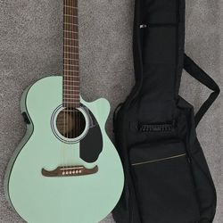 Guitar - Turquoise With Carry Case Included