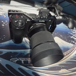 Sony a6700 mirrorless camera, Sigma 30mm f1.4, dji rs4 mini combo gimbal