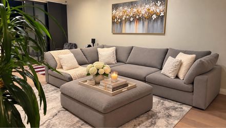 131” Gray Fabric Sectional Sofa with Ottoman