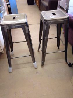 Barstool: perforated top 29 inches.