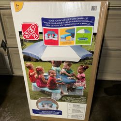 Sun and Fun Picnic Table With Umbrella 
