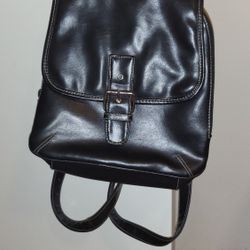 Black Stylish Backpack that has a lot of compartments 