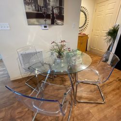 St. Paul Round Chrome Tempered Glass Dining Table by Porch & Den