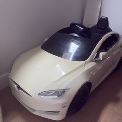Radio Flyer Tesla Model S for Kids.   Paid $500 And Never Really Used It.
