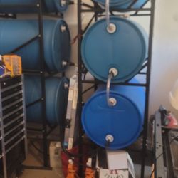 Water Storage Racks And 50 Gallon Drums