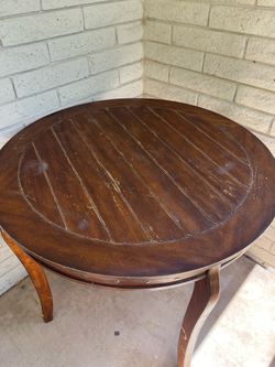 Round Wood Pedestal Table with Studded Detail