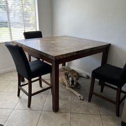 Tall marble top dining room table