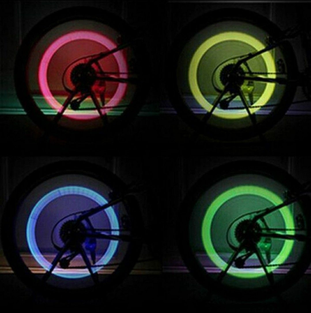 4 Firefly Flashing LED Tire Light Valve Stem Cap Car Bicycles Bikes Motorcycles New with batteries 10$ for 4 caps RED,BLUE,GREEN OR YELLOW
