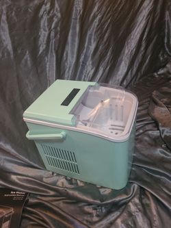 Ice maker. For the countertop,Light green,white trim, never used