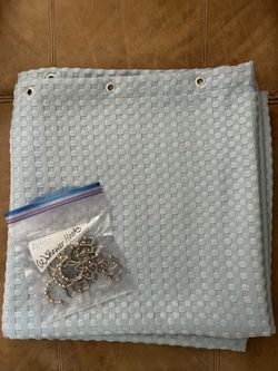 Shower curtain, white rod, and hooks