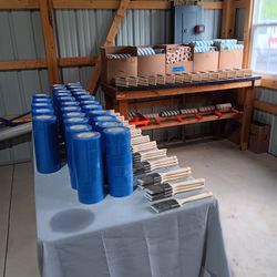 Lots Of Painters Tape, Paint Brushes And Paint Rollers