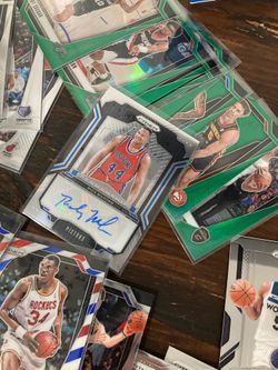Bunch of 24-25 NBA cards with sleeves and clear box. Bunch of rookies and more