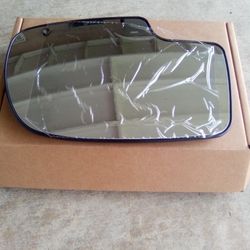 New 1999 to 2006 Chevy truck passenger side mirror. $25 for power mirror application.