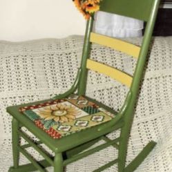 Antique Ladies Wood Rocking Chair Sunflowers measurements Height from floor to top of back - 34" Width of seat at widest in front- 16" Depth of seat -