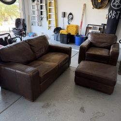 Leather Love Seat, Chair, And Ottoman