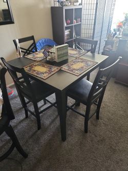 Table And 4 Chairs