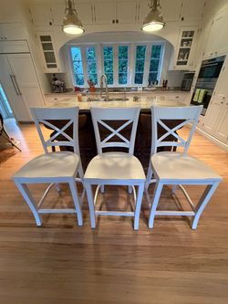 Crate and Barrel white wood counter barstools