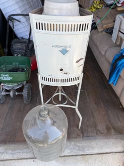Antique / vintage arrowhead water dispenser