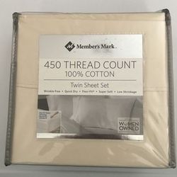 New in package 450 thread count twin sheet set ivory flat sheet, fitted sheet and pillow case