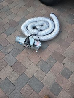 Dryer vent booster with expandable hose