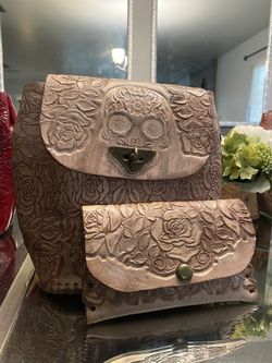 Hand Tooled Leather Backpack & Clutch